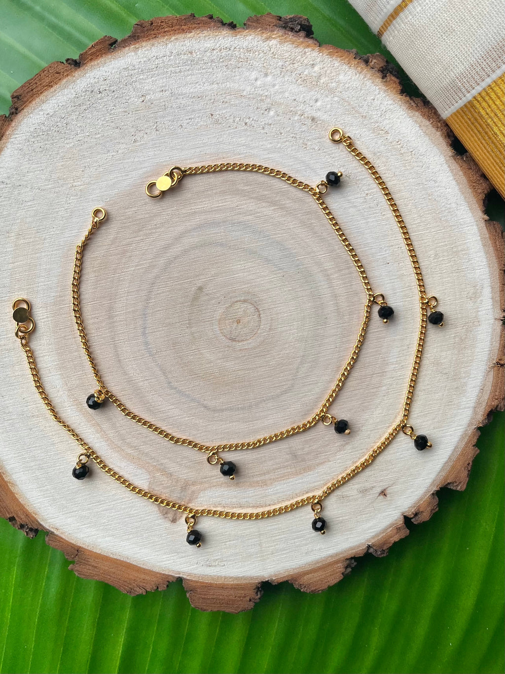 Black hanging crystal stone anklets