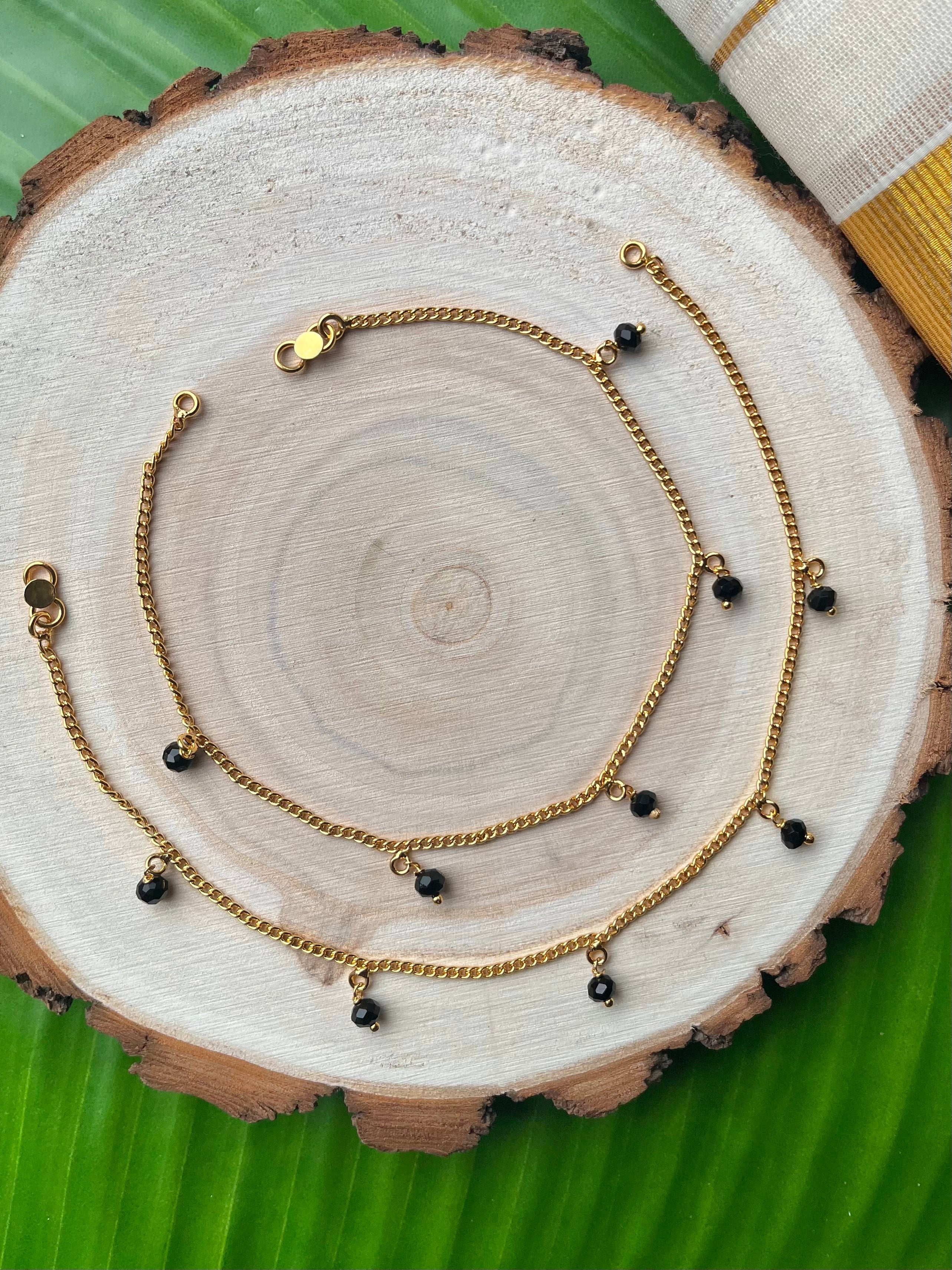 Black hanging crystal stone anklets