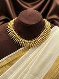 Mullamottu necklace with ruby stones