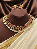 Necklace set with red and green accent stones