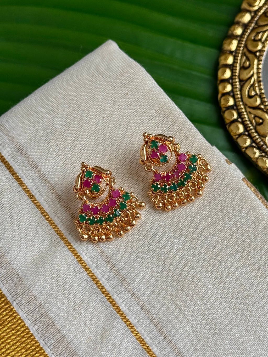 Ruby and emerald accent stone studs